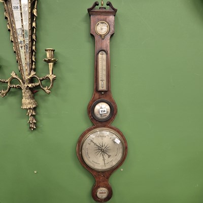 Lot 334 - A late Georgian mahogany five-glass wall...