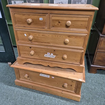 Lot 338 - A pine chest of four drawers H 64 W 90 D 43cm...