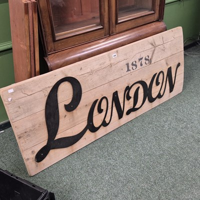 Lot 348 - A large pine and iron London 1878 sign 60 × 150cm
