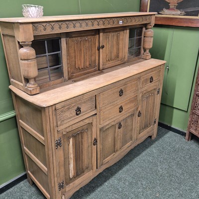 Lot 368 - A stripped Ercol oak court cupboard H 133 W...
