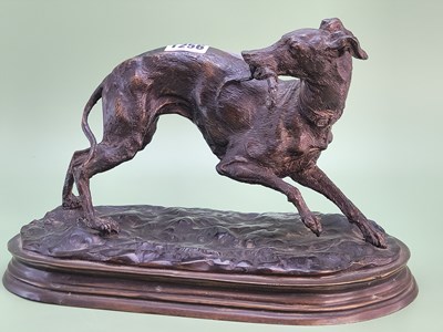 Lot 1256 - After Mene, a bronze figure of a whippet on a...