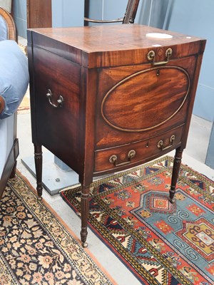 Lot 1264 - A George III mahogany cellarette with rising...