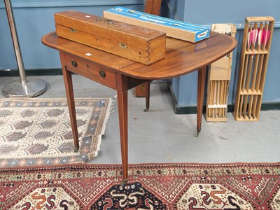Lot 1266 - A late Georgian mahogany and inlaid drop leaf...
