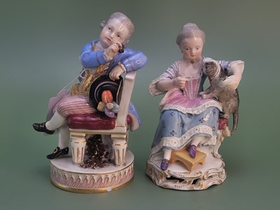 Lot 1313 - Two early 20th century Meissen seated figures,...