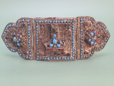 Lot 1315 - An antique handmade Buddhist belt fastening ...