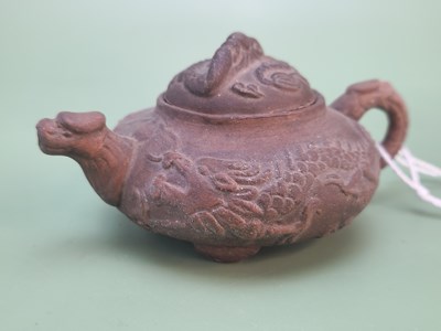 Lot 1316 - A small Chinese Yixing tea pot with dragon...