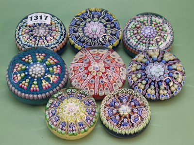 Lot 1317 - Eight millifiori glass paperweights