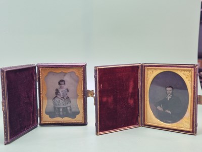 Lot 1148 - Two 19th century portrait photographs, one...