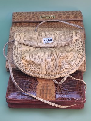 Lot 1198 - A collection of four vintage reptile skin...