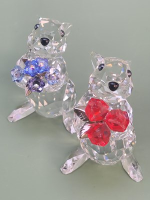 Lot 1199 - Four Swarovski glass models, including two...