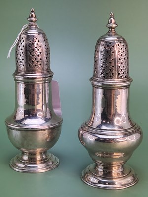 Lot 1195 - A matched pair of silver baluster-shaped...