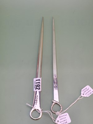 Lot 1192 - Two late 18th-century silver meat skewers,...