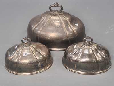 Lot 1187 - A pair of electroplated meat dish covers and...