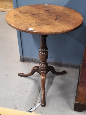 Lot 1342 - A 19th century oak tripod table H 70  Ø 57cm