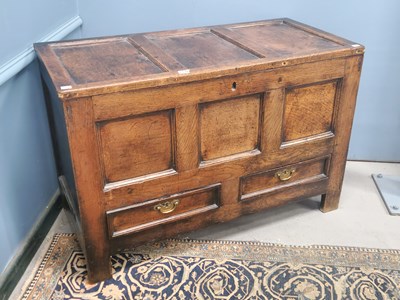Lot 1339 - An 18th century two drawer oak panel mule...