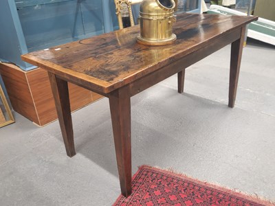 Lot 1348 - A two plank cleated end oak refectory table on...