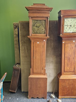 Lot 1360 - An oak long cased clock, the square brass dial...