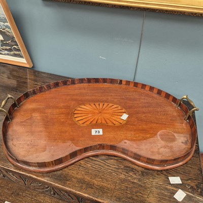 Lot 73 - An Edwardian kidney shaped drinks tray