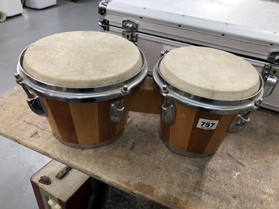 Lot 757 - A pair of bongo drums