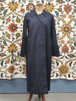 Lot 51 - A Burberrys London Navy long coat.  With a...
