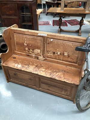 Lot 127A - A vintage panelback pine box settle H 84 W 118...
