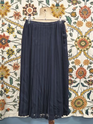 Lot 57 - Clothing by Jaeger, to include two navy skirts...