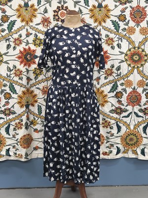 Lot 63 - Clothing by Jaeger - A navy and white button...