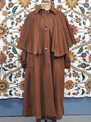 Lot 71 - Clothing - A brown cape trench coat by Georges...