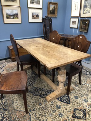 Lot 1345 - A vintage oak refectory table, the cleated...