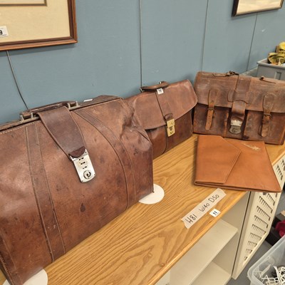 Lot 10 - A vintage leather Gladstone bag, two leather...