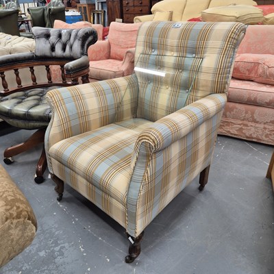 Lot 41 - A 20th century armchair in a pastel tartan fabric