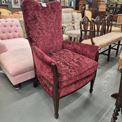 Lot 51 - An Edwardian mahogany armchair in a maroon fabric