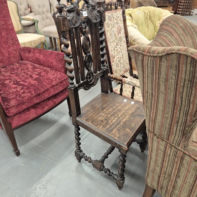 Lot 56 - A decoratively carved Victorian oak hall chair...