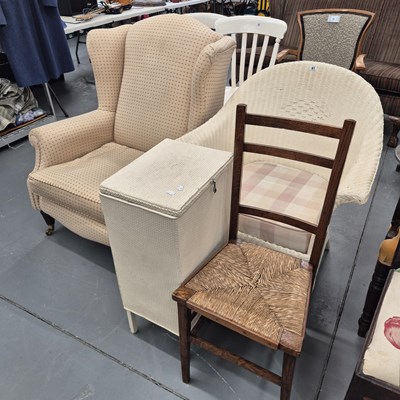 Lot 61 - A Lloyd Loom arm chair and a linen basket,...
