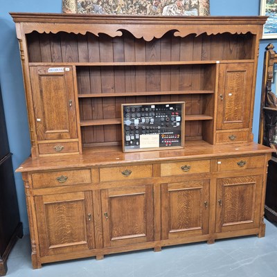 Lot 74 - A bespoke large Georgian style oak four-door...
